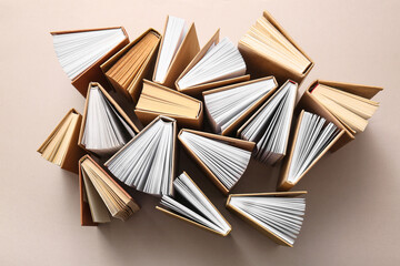 Obraz premium Composition with open books on beige background