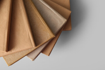 Stack of books on grey background