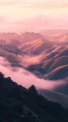Obraz premium Pink sunset over foggy hills
