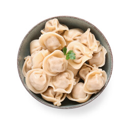Bowl with delicious boiled dumplings and parsley on white background