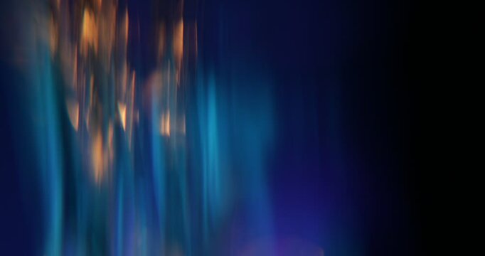 Abstract light leaks on black background with copy space. Studio lens flare bokeh effect. 4k video