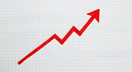 Graph paper page with a rising red arrow sketched on it