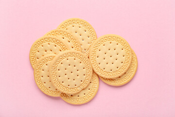 Many sweet cookies on pink background