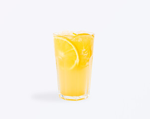 Yellow citrus lemonade with lemon slices isolated