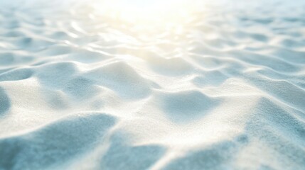 Soft white sandy beach with gentle textured surface under warm sunlight creating relaxing summer coastal scene perfect for travel tourism and nature backgrounds