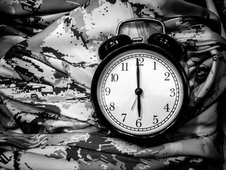 vintage alarm clock on grunge background