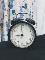 An alarm clock showing the time