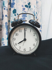 An alarm clock showing the time