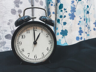 An alarm clock showing the time