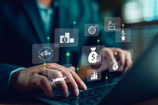 Businessman using laptop with financial icons, representing fintech, investment management, digital banking, currency exchange, interest rate, savings, financial growth, and smart money strategy.
