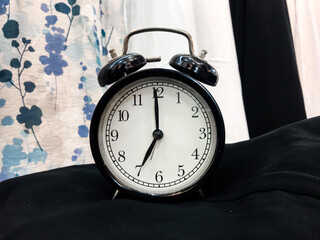 An alarm clock showing the time