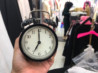 An alarm clock showing the time