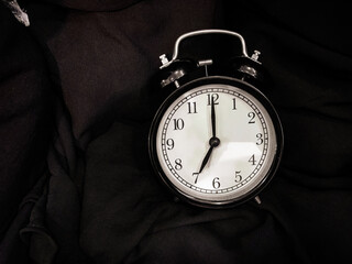 An alarm clock showing the time