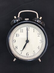 An alarm clock showing the time