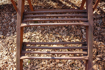 Rusty steps on a street iron staircase