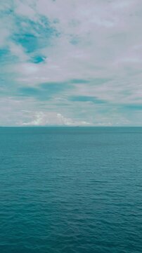 Scenic Ocean View from a Ship with Boats in Motion