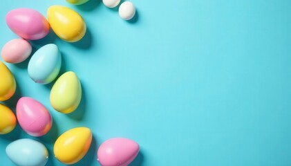 Scattered multicolored Easter eggs on a light blue background; a cheerful overhead shot , eggshell, pastel, colorful