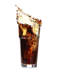 Cola splashing out of glass isolated on white