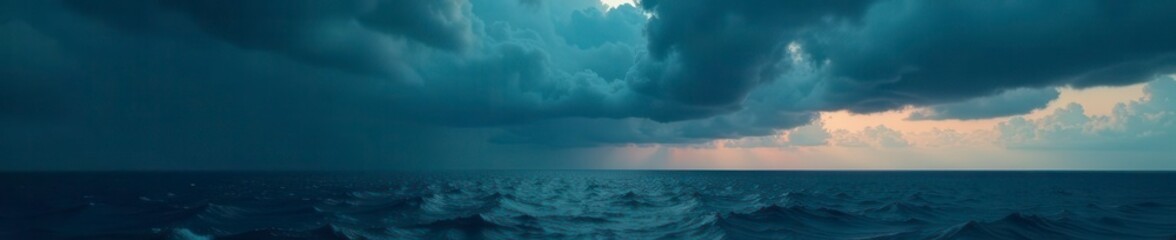 Obraz premium Dark, brooding clouds swirl above a churning, inky sea , natural disaster, moody