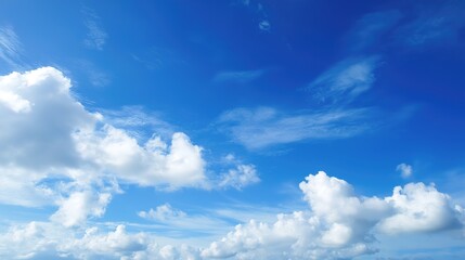 Obraz premium Vast blue sky with scattered clouds, a serene minimalist canvas of endless calm