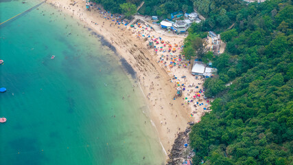May 1 2025 Secluded Beach with Boats and Dense Forest Surrounding
