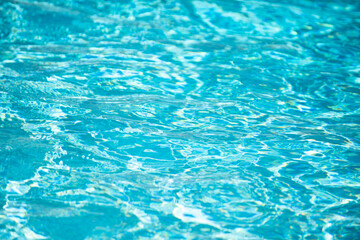 Pool water background, blue wave abstract or rippled water texture background.