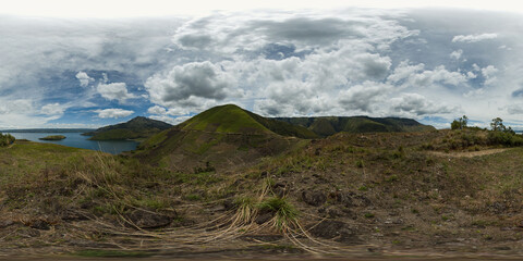 A beautiful lake among mountains and volcanoes. Lake Toba and Samosir Island. Sumatra, Indonesia. 360VR.