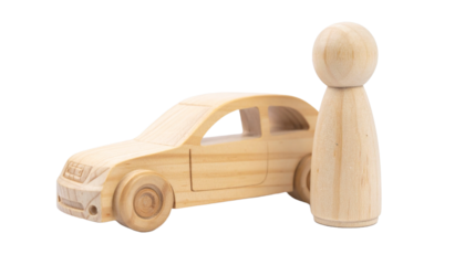 Wooden car and figure model: a charming wooden car model next to a matching wooden figure, perfect for a child's imagination 