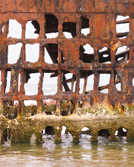 Close up view of Wreck of the Peter Iredale along pacific coast in Oregon, USA.