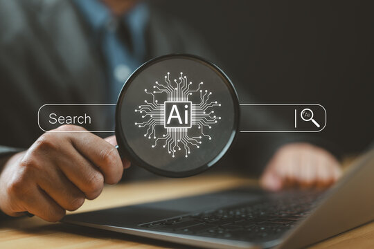 Ai tech search concept, businessman use magnifying glass focus to AI search engine bar for data search optimization by artificial intelligence technology.