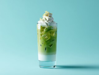 Refreshing Matcha Latte with Whipped Cream Delight on a Bright Turquoise Background Scene
