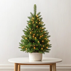 Tabletop mini tree with fairy lights on white background