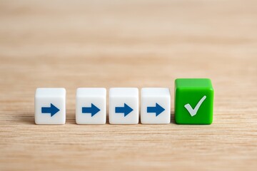 Green Checkmark Success Concept Wooden Background White Cubes Blue Arrows Process Completion Achievement Target Goal Strategy Planning Decision Making Right Choice Correct Answer Business Progress    
