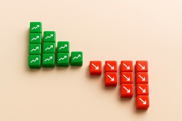 Green and Red Cubes Showing Growth and Decline Financial Market Trends Business Success and Failure Investment Strategy Upward and Downward Arrows Visual Representation of Economic Statistics Data    