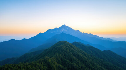 Majestic mountain range with soft pastel sky at dawn, showcasing serene beauty and tranquility