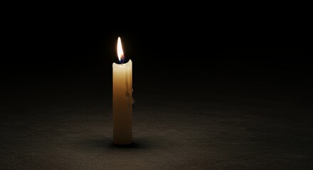 A Single Lit Candle in the Darkness: A Symbol of Hope and Remembrance