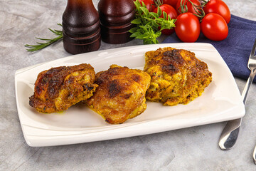 Roasted chicken thighs  with spices