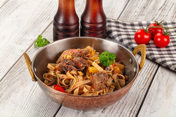 Asian udon noodles with beef