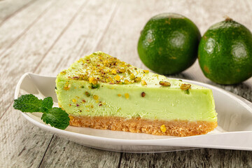 Green pistachio cheesecake served mint