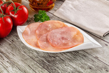 Smoked pork tenderloin fillet slices