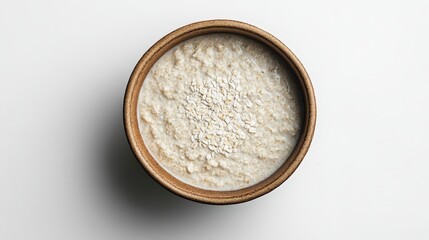 Creamy Porridge Bowl Captured From Above on a Minimal White Background