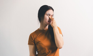 Asian girl expresses dislike, person express negative feeling, concept business complaint from...