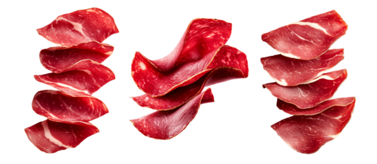 Set of thin slices of cured meat Bresaola with marbled texture isolated on white transparent background, concept of delicacy.