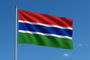 Obraz premium Gambia national flag flying in sunlight