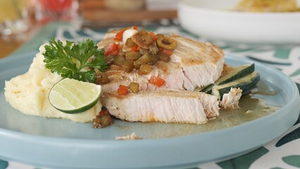Exquisite grilled fish fillet paired with creamy mashed potatoes and fresh vegetables Appetizing gourmet plate featuring juicy fish smooth potatoes vibrant vegetables and assorted seasonal vegetables