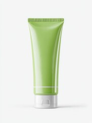 Green cosmetic tube mockup with white cap perfect for skincare product