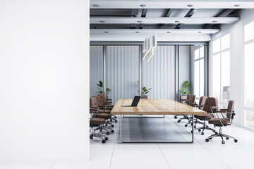 Modern conference room with large wooden table, office chairs, laptop, blank white wall for copyspace, city view through large windows, clean design. 3D Rendering