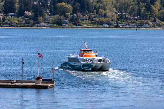 A Kitsap Fast Ferry departs the Bermerton port, in Washington State, on April, 14, 2025. The Fast Ferry provides public transportation to Seattle, Kingston, Southworth and Bermerton.