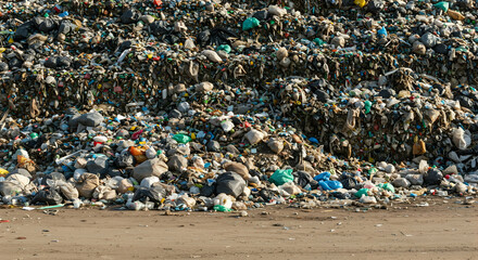 Piles of Litter and Waste on Beach Representing Environmental Pollution