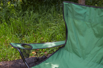 Set of folding furniture for camping, chair, summer nature of wild meadow
